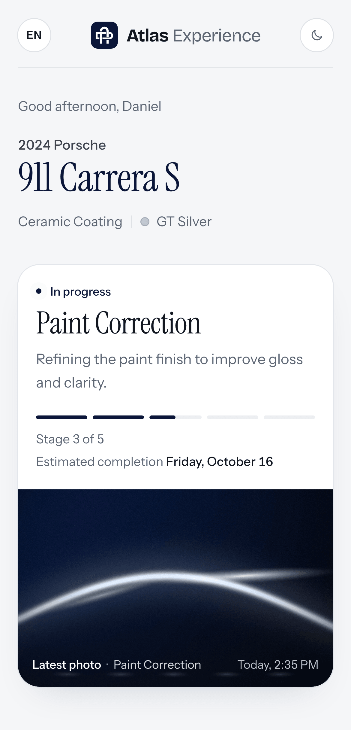 Atlas Experience customer tracking page on a phone: the vehicle, the current stage, progress through five stages and the latest photo.